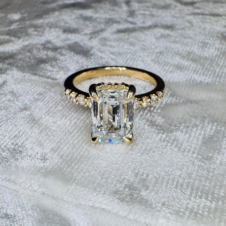 Emerald-cut diamond engagement ring