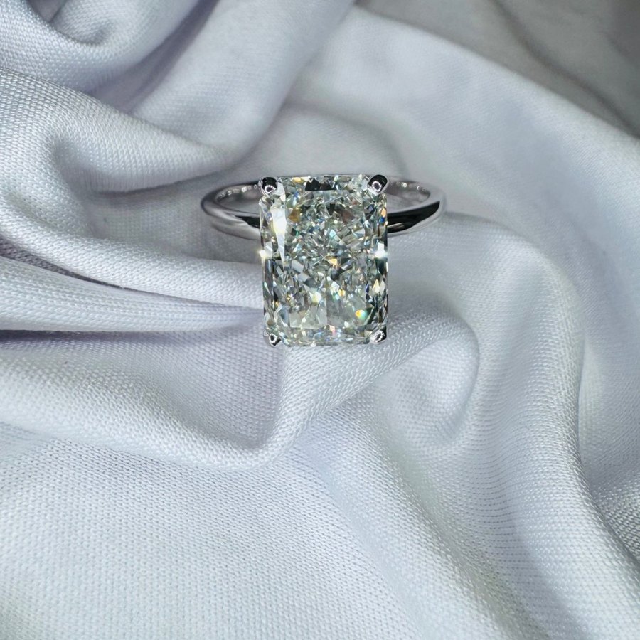 Radiant-cut diamond solitaire ring